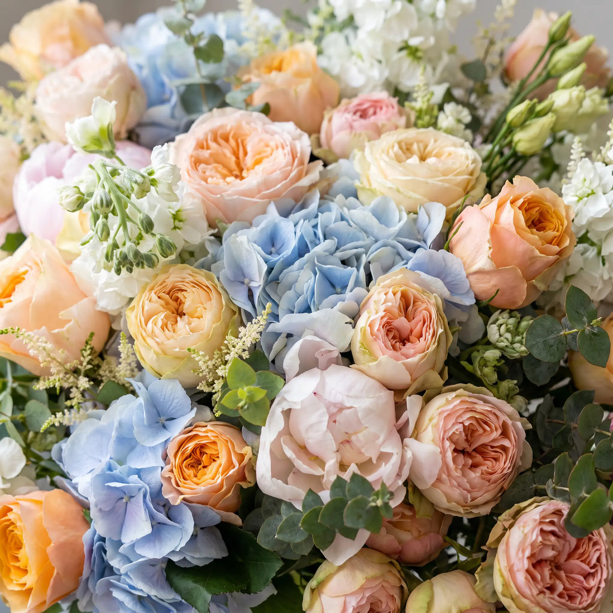 Close-up of Apricot Muse hand-tied flower bouquet