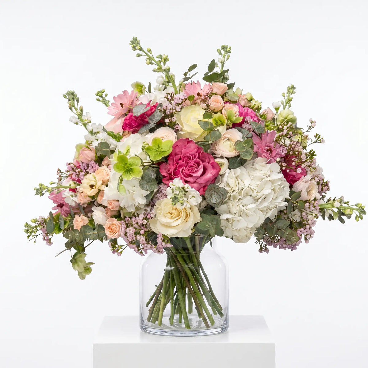 Blush Affair flower bouquet arranged in a glass vase