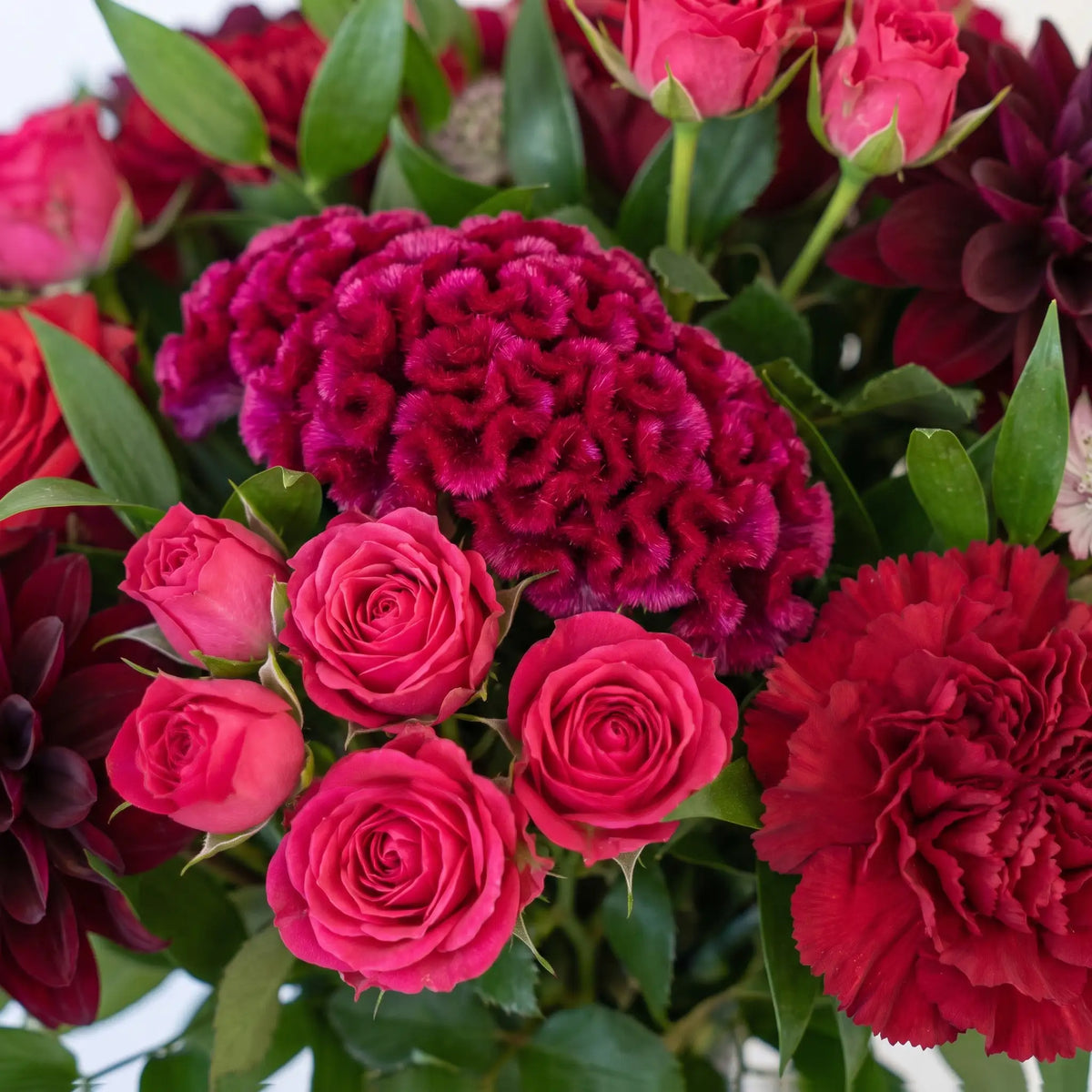 Close-up of Crimson Kiss hand-tied flower bouquet