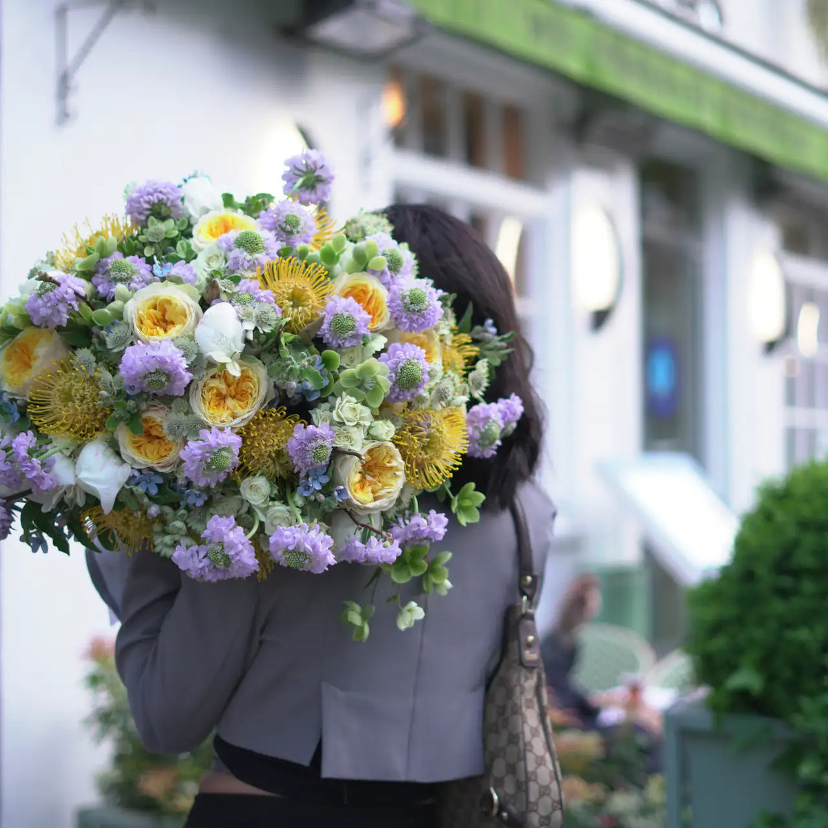 Garden Tropics flower bouquet styled in a lifestyle setting