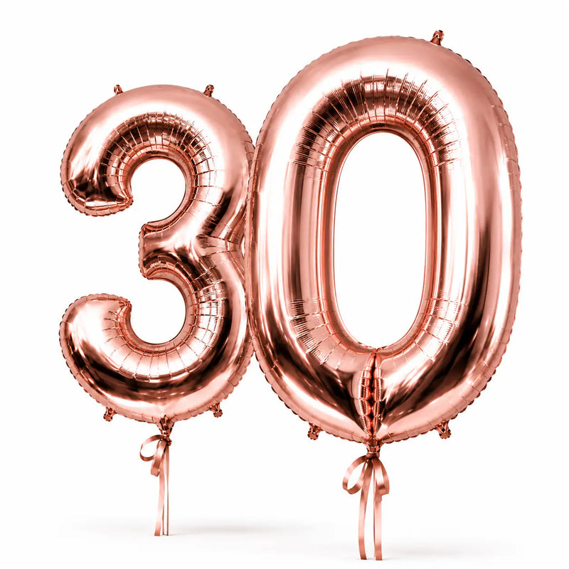 Giant rose gold number helium balloons by The SoArt