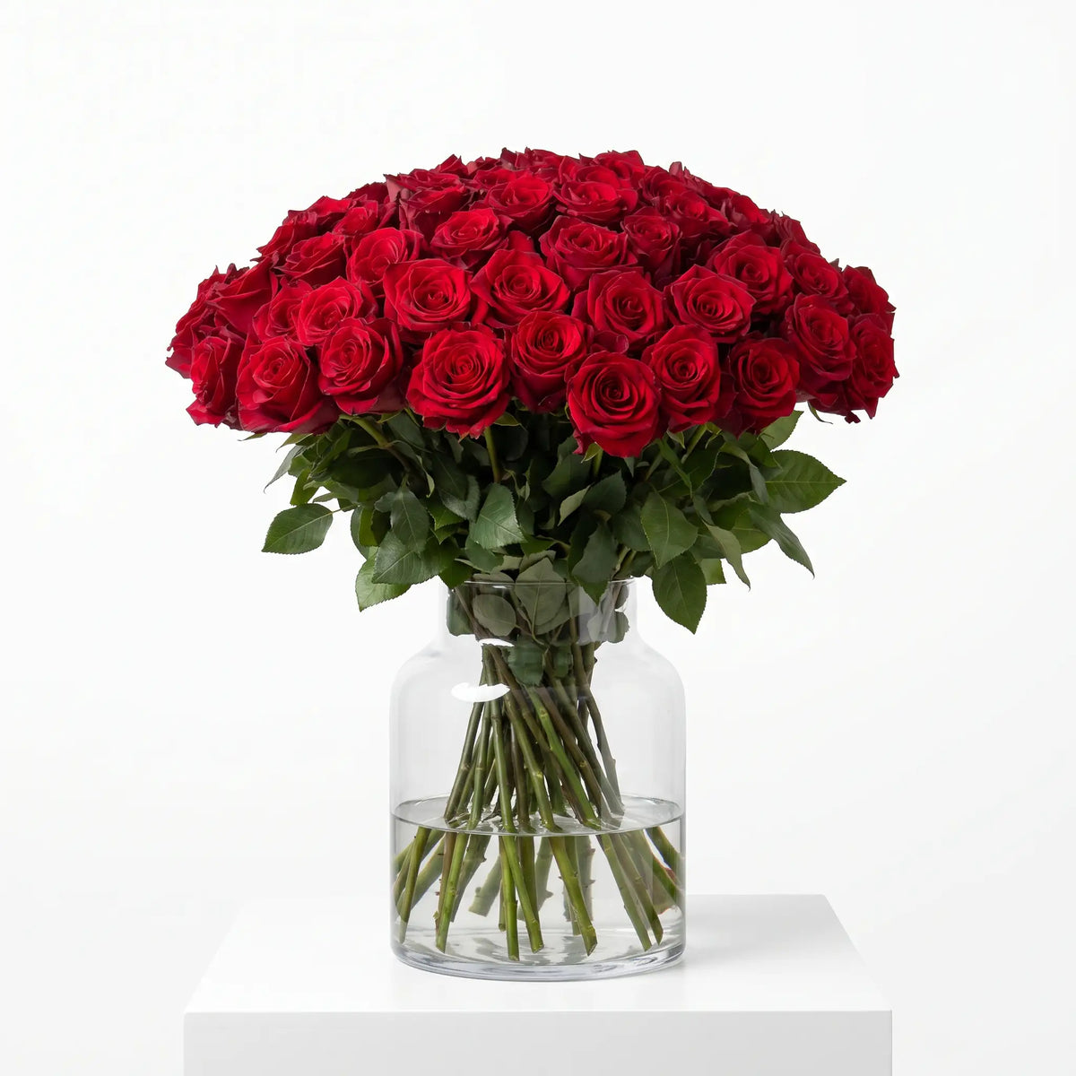 Just Roses Red rose bouquet arranged in a glass vase
