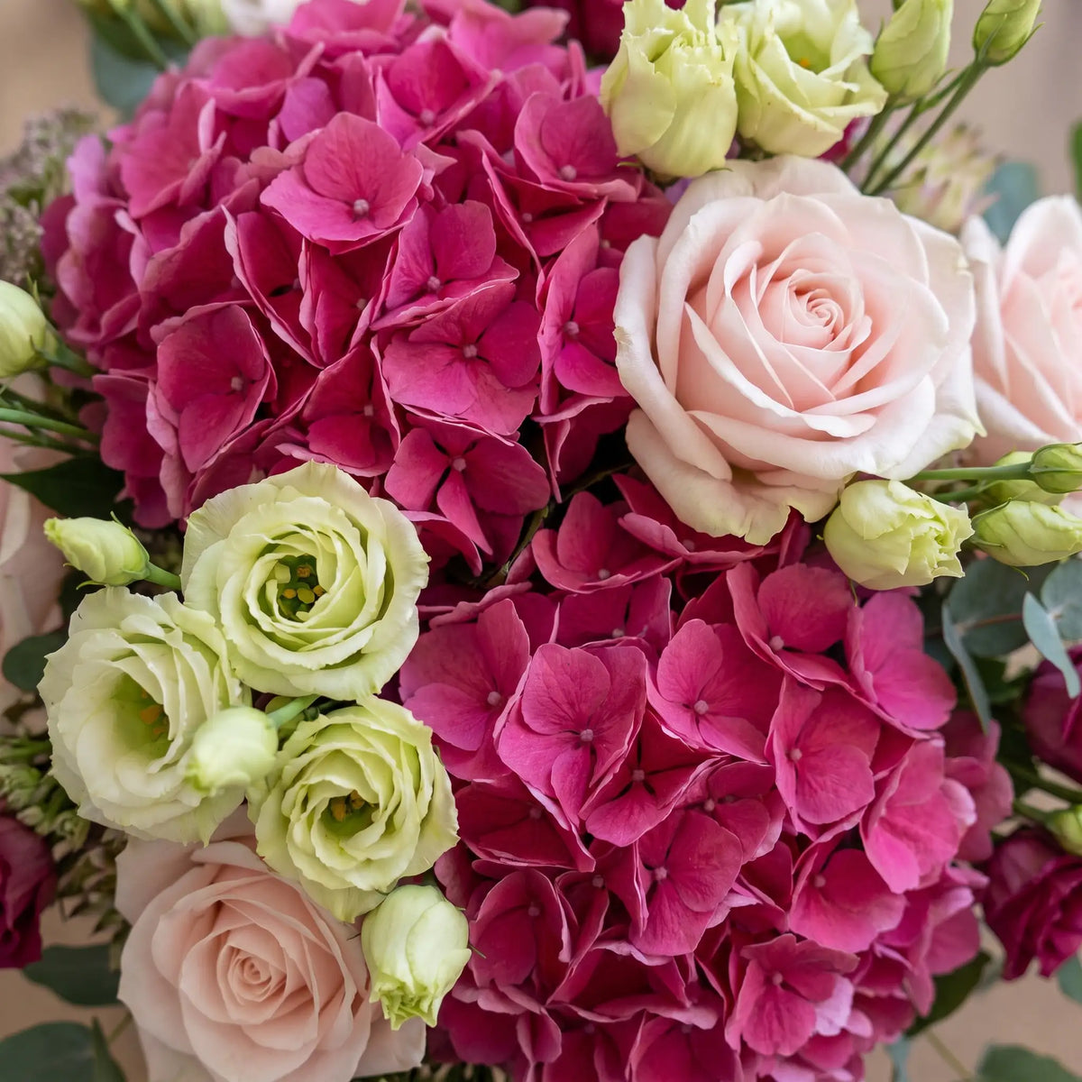Close-up of Magenta Charm hand-tied flower bouquet