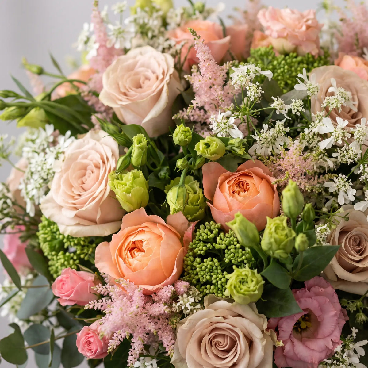 Close-up of Peach Reverie hand-tied flower bouquet