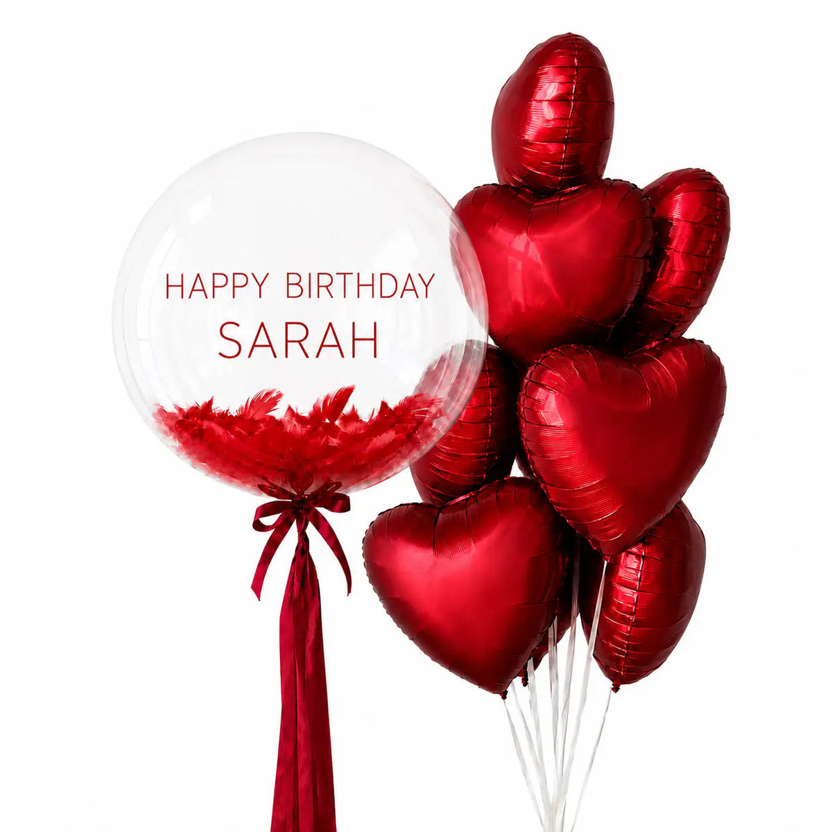 Red personalised bubble and heart balloon bouquet with feathers by The SoArt