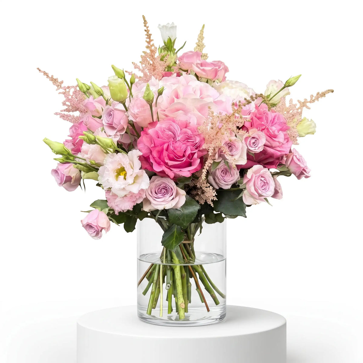 Pink Symphony flower bouquet arranged in a glass vase