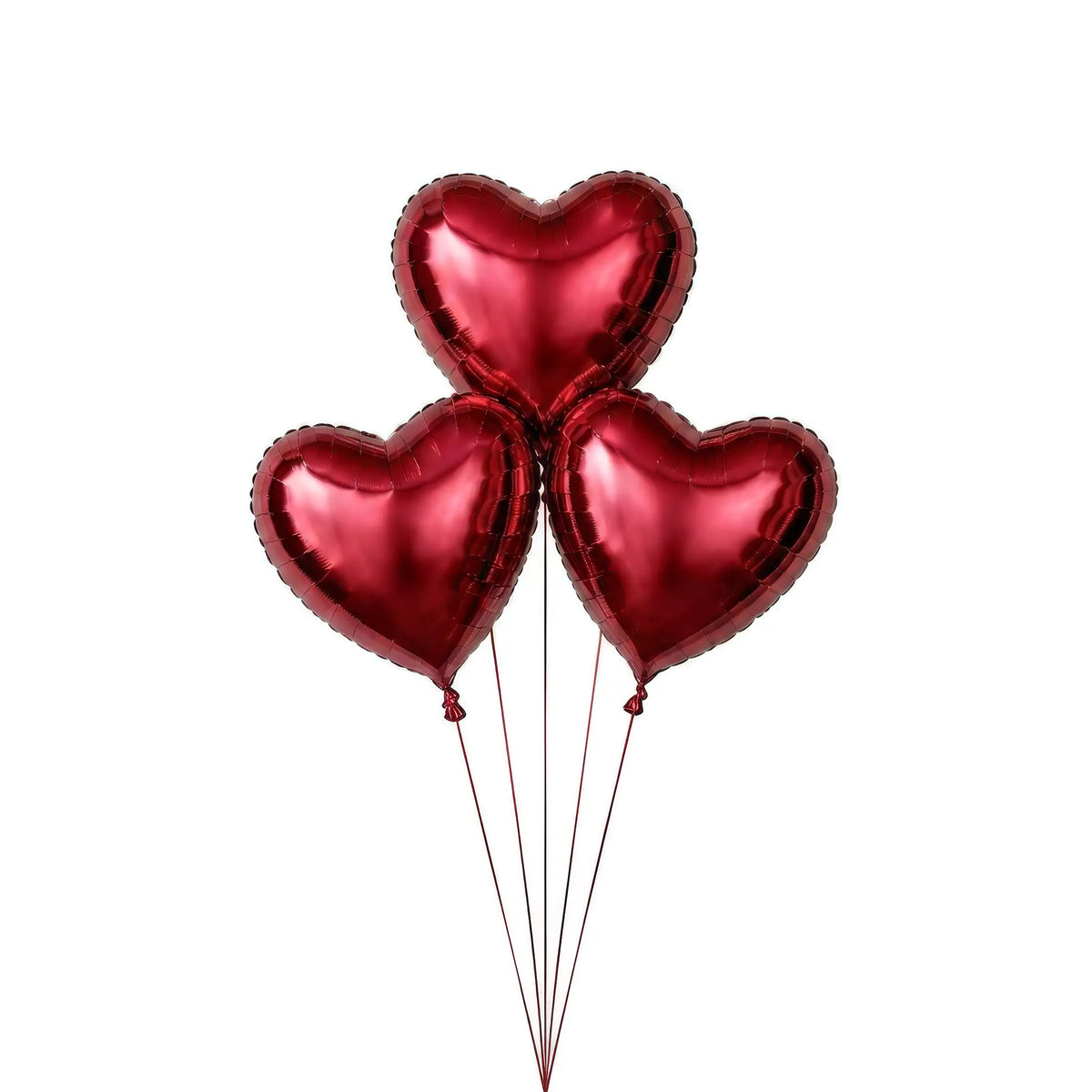 Three red heart helium balloons by The SoArt