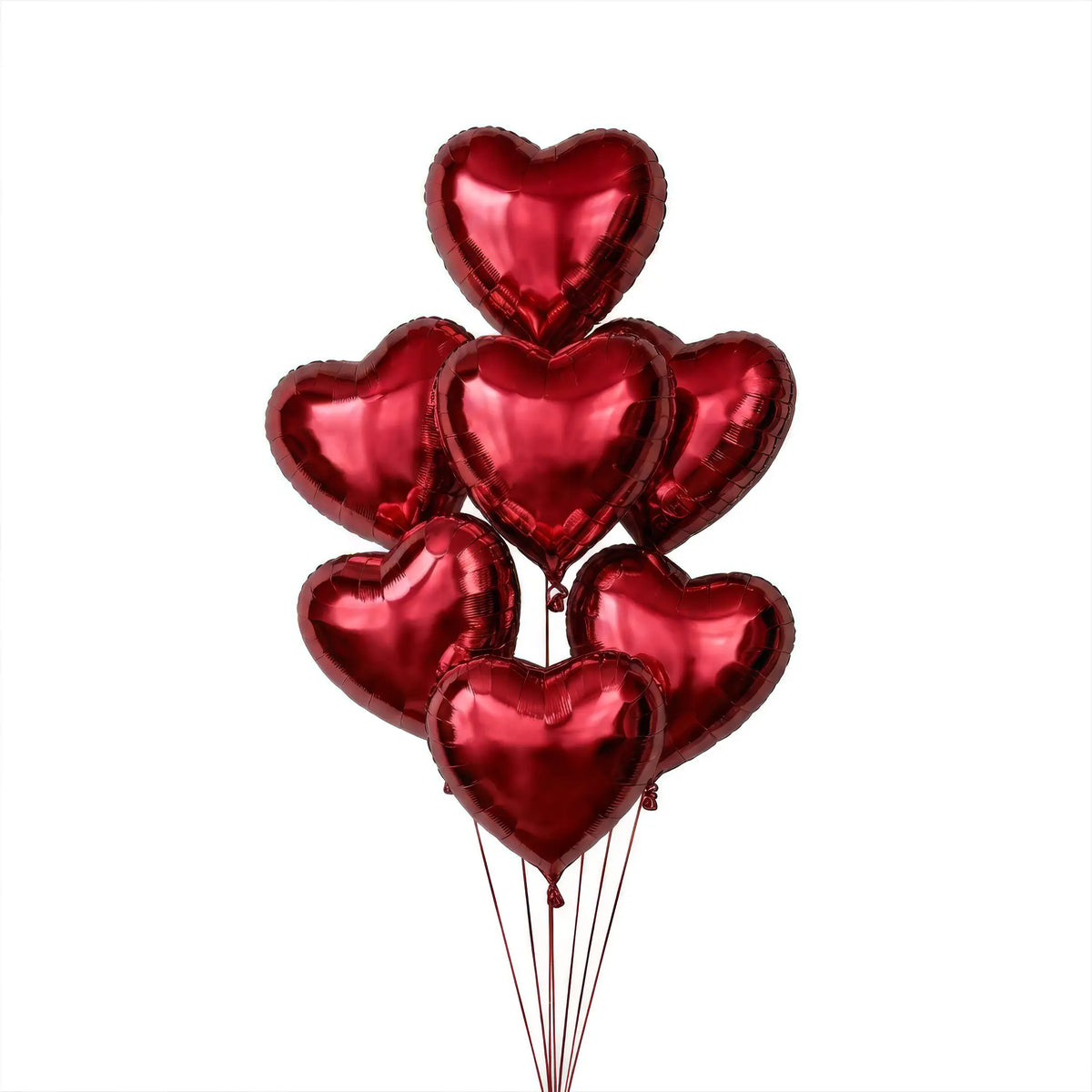 Seven red heart helium balloons by The SoArt