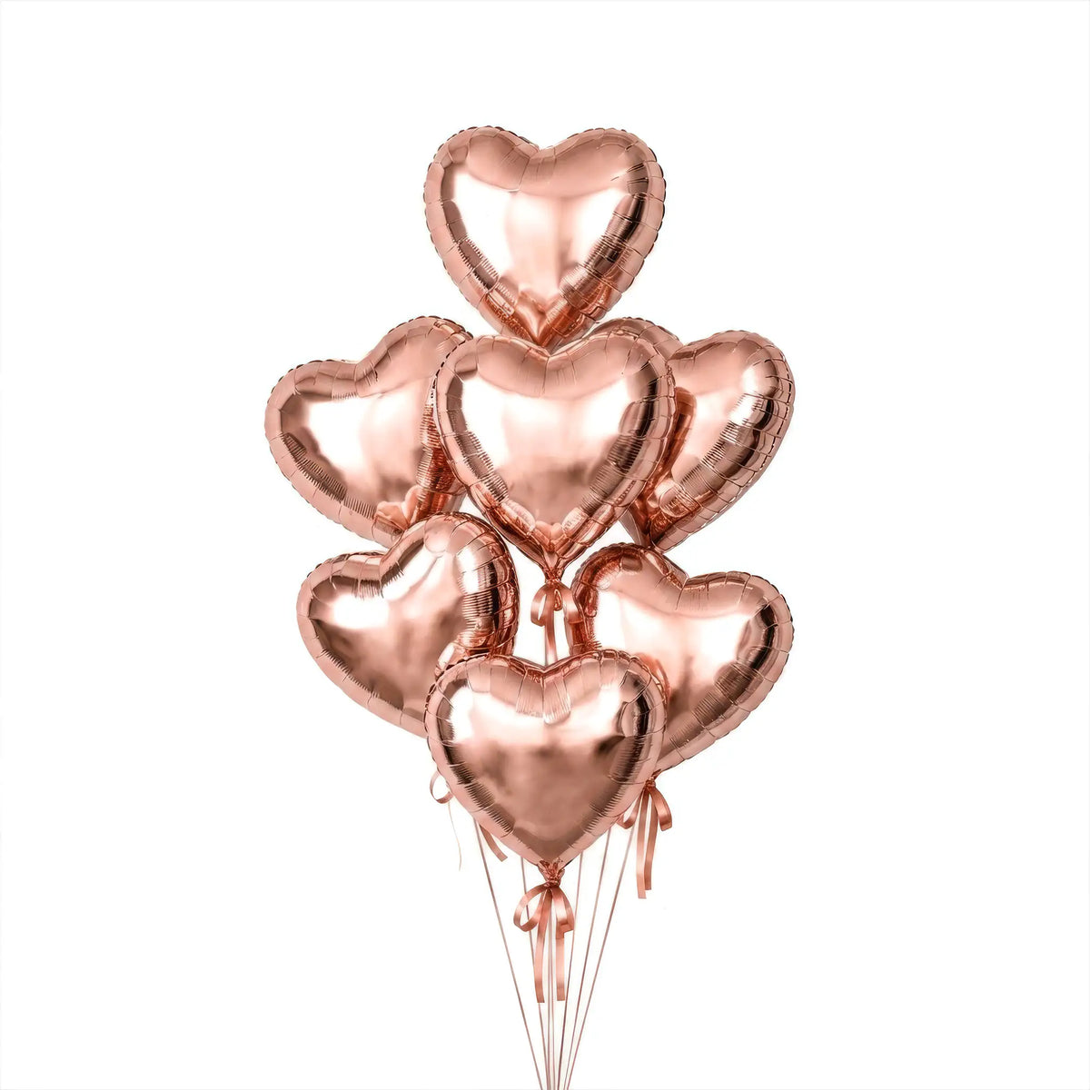 Seven rose gold heart helium balloons by The SoArt
