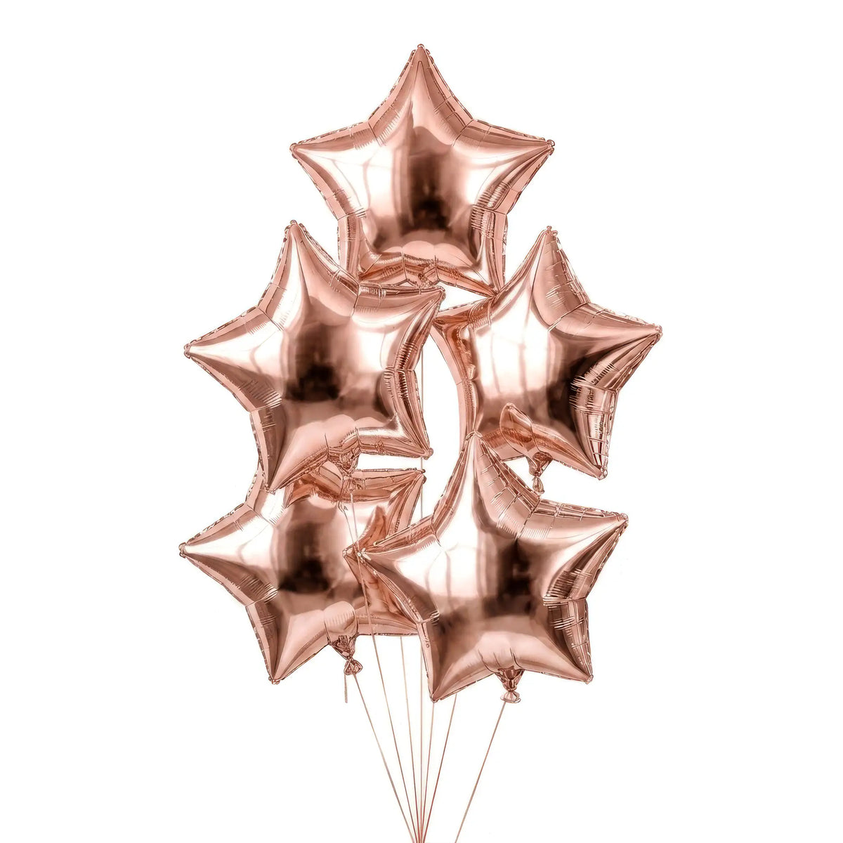 Five rose gold star helium balloons by The SoArt
