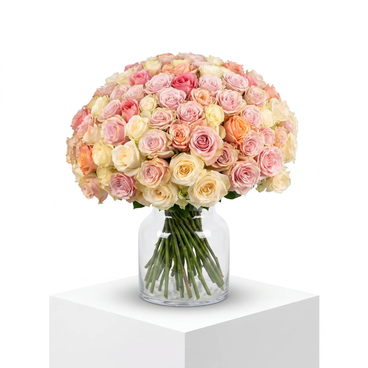 Rose Harmony rose bouquet arranged in a glass vase