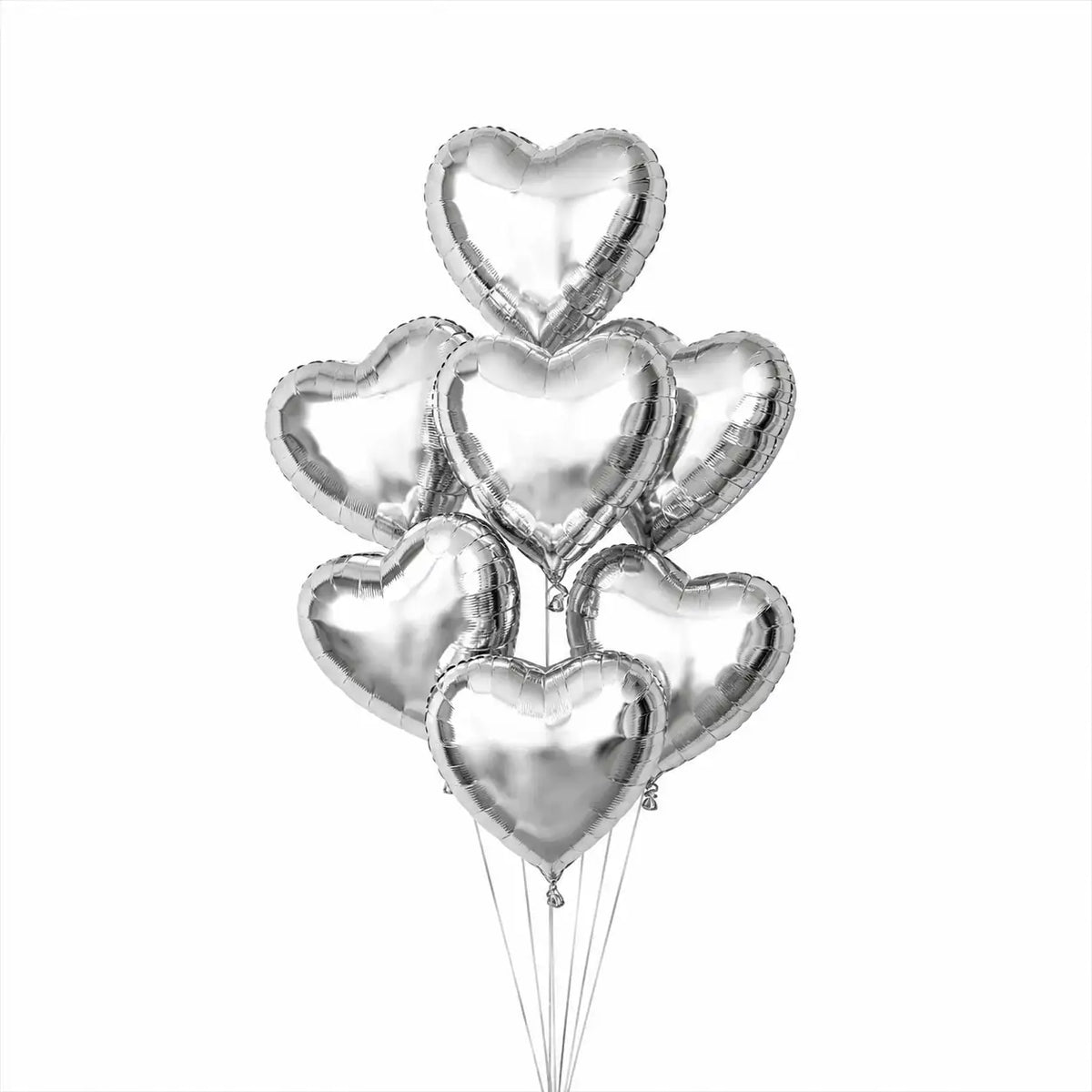 Seven silver heart helium balloons by The SoArt