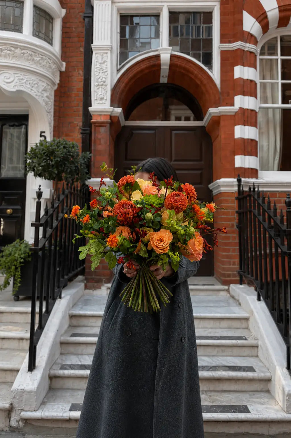 Sunset Grove flower bouquet styled in a lifestyle setting