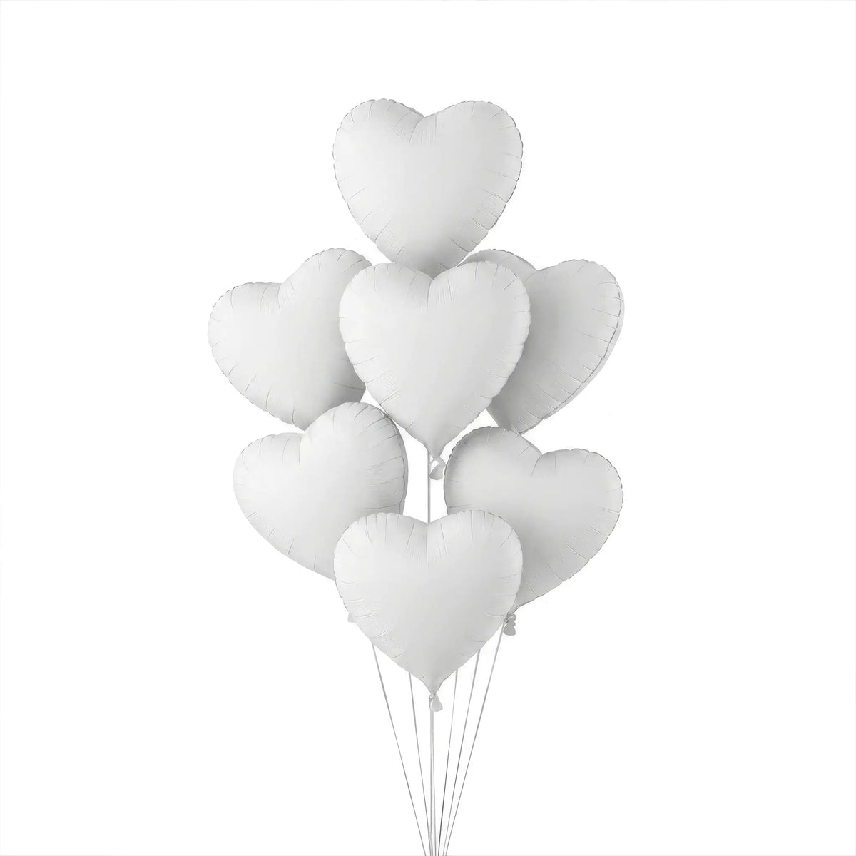 Seven white heart helium balloons by The SoArt